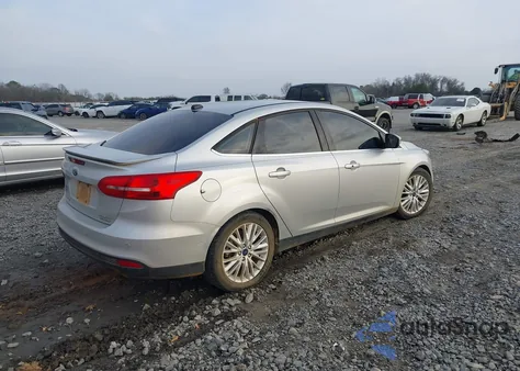 2016 Ford Focus Titanium из США, поврежденный, VIN 1FADP3J23GL228684